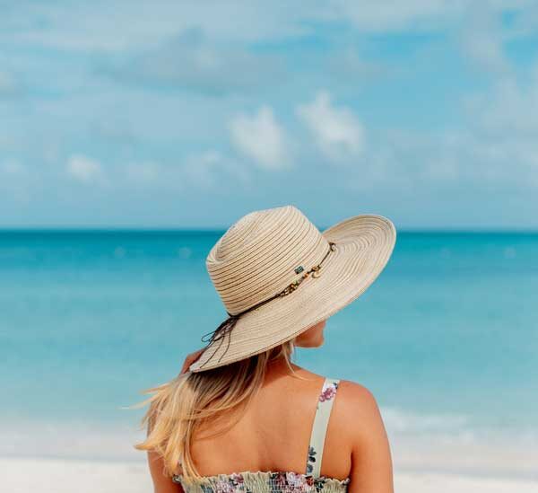 a beautiful woman relaxing on wondafull nzanzibar beaches