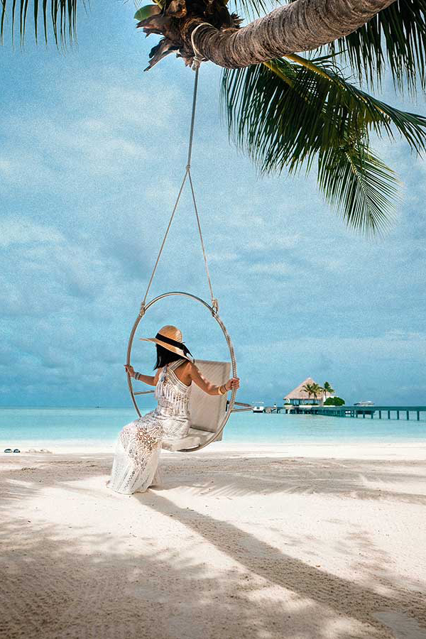 Beautiful woman relaxing and enjoying stunning view of zanzibar beach.Photo taken on january 2026.